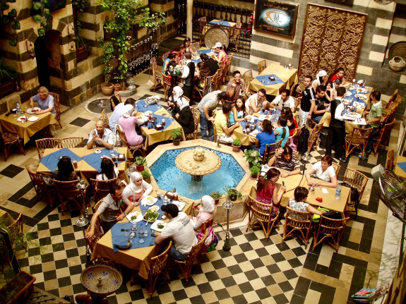 People dining at a cafe in Damascus, Syria.